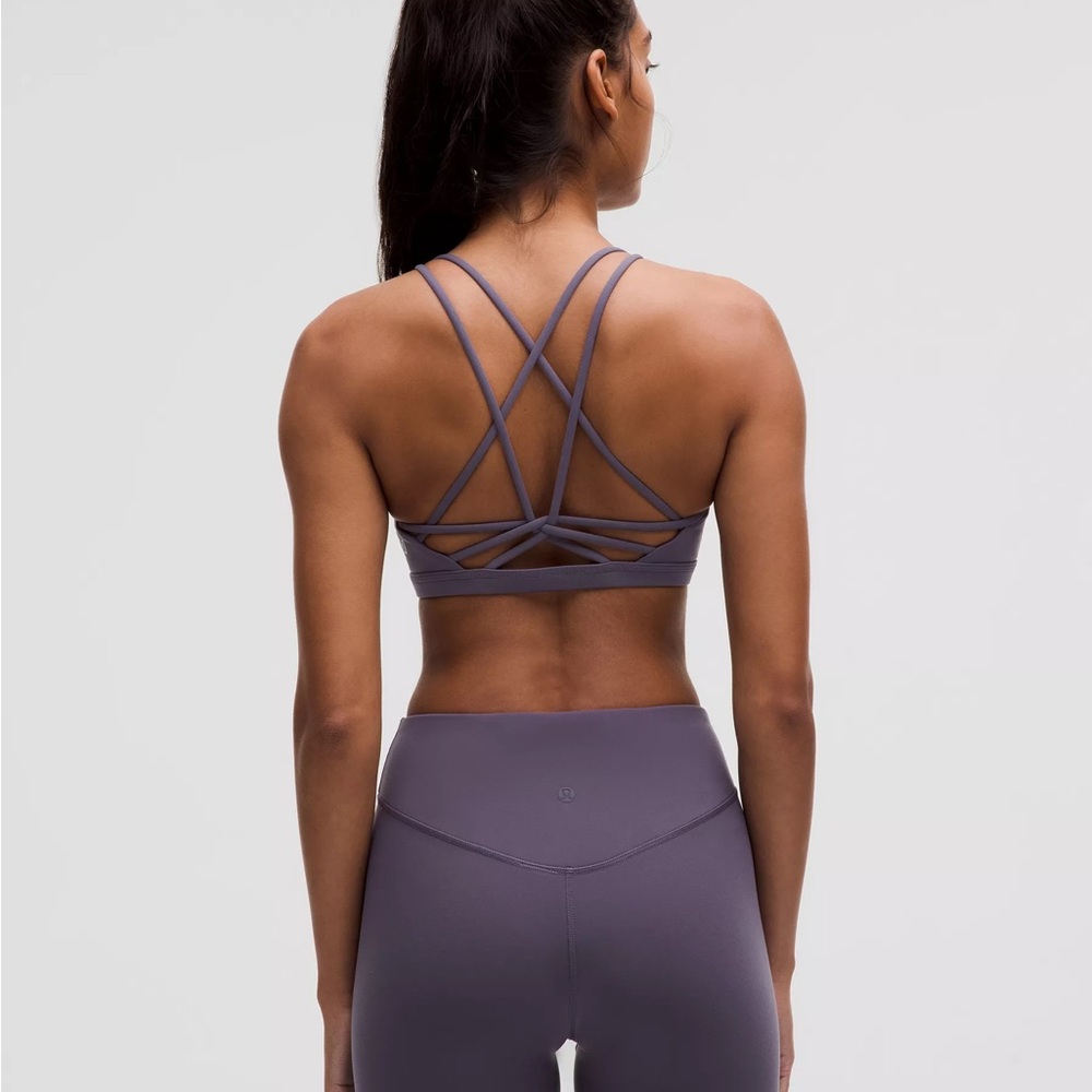 Lululemon Purple Criss-Cross Sports Bra and leggings